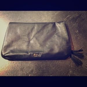 R&J black folding clutch.